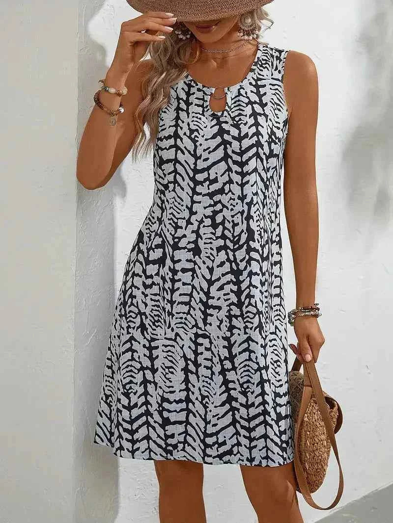 Midi Jurken : Mouwloze Midi Jurk Dames met Abstracte Zomerprint in Zwart van Pantinoshop