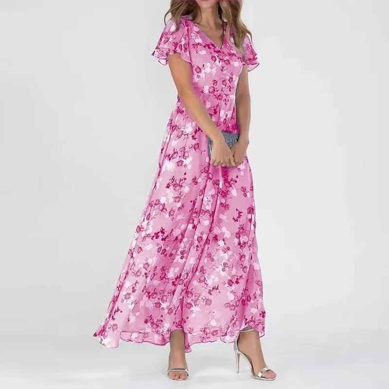 Standaard : Vloeiende Jurk met Elegante Bloemenprint en Overslagdetail in Roze van Pantinoshop