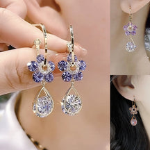 Earrings : Ring Paars - Luxury Flower Earrings - Modieuze Glanzende Kristal Accessoires in Paars van Pantino