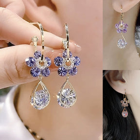 Earrings : Ring Paars - Luxury Flower Earrings - Modieuze Glanzende Kristal Accessoires in Paars van Pantino