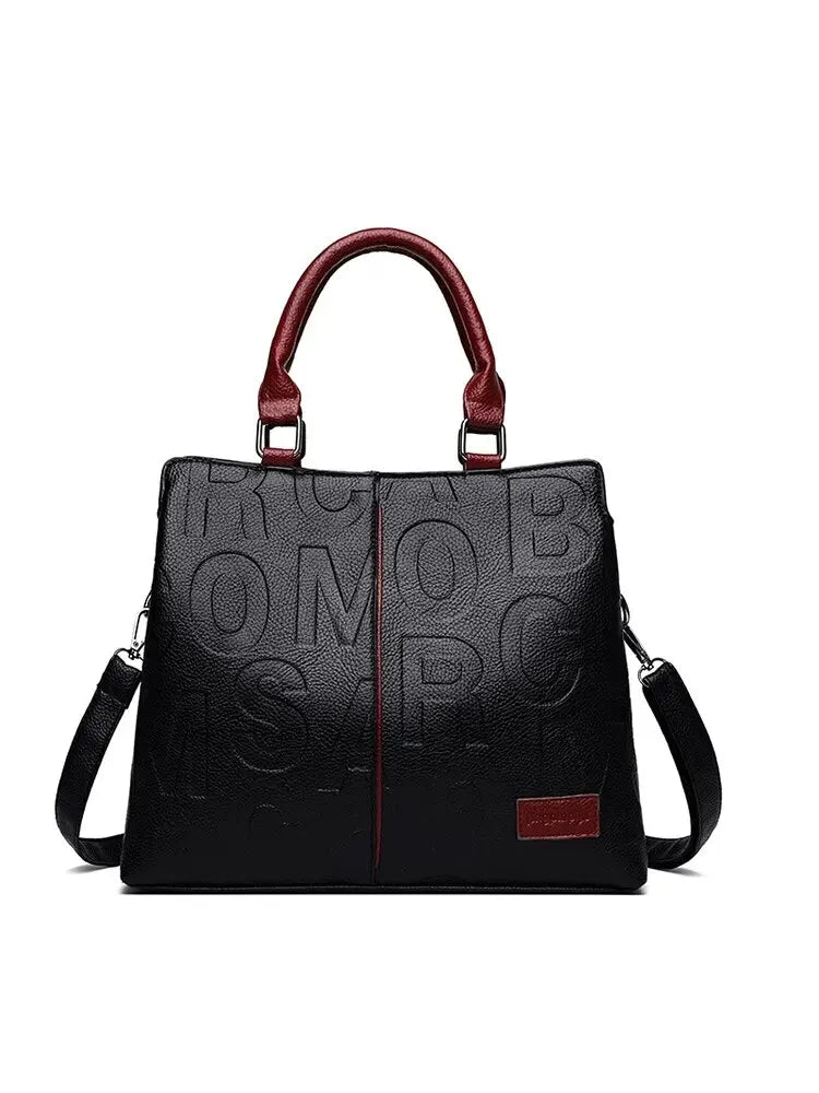 bags : Handtas Dames - Reliëfontwerp Letters Rood Handvat - Zacht Leer in Rood handvat van Pantino