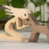 Træskulptur af mand og hund