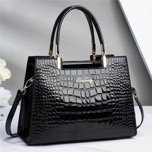 bags : Glossy Handtas - Bruin in Zwart (nog 2 op voorraad) van Pantino