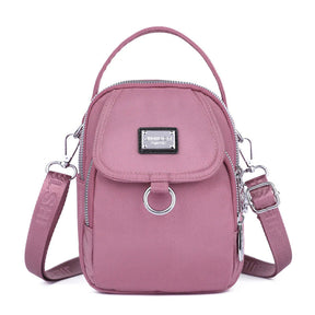 bags : Crossbody Tas Blauw - PhoneBag - Telefoonhoesje met Rits voor in Lichtroze van Pantino