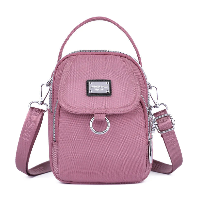 bags : Crossbody Tas Blauw - PhoneBag - Telefoonhoesje met Rits voor in Lichtroze van Pantino