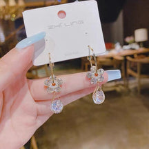 Earrings : Ring Paars - Luxury Flower Earrings - Modieuze Glanzende Kristal Accessoires in Zilver van Pantino