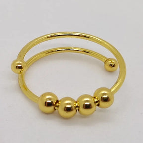 Ring : Anti Stress Ring Goud - Draaibeweging Rustig Worden - Metaal in Goud van Pantino