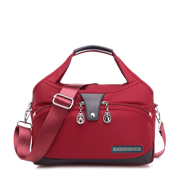 bags : Anti-Diefstal Handtas Dames Paars - Verborgen Vakken Veilig - Nylon in Rood van Pantino