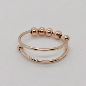 Ring : Anti Stress Ring Goud - Draaibeweging Rustig Worden - Metaal in Rosé Goud van Pantino