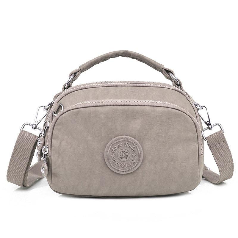 Tassen : Lauren Crossbody Tas Dames - Meerdere Kleuren - Verstelbaar in Licht Grijs van Pantino