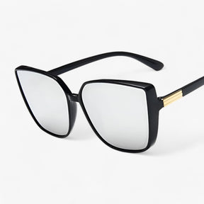 Cat Eye Sunglasses : Zonnebril Oranje Grijs - Mariana Vintage Kat-ogle - Chic en Gedurfde Stijl in Zwart Zilver zoals getoond van Pantino