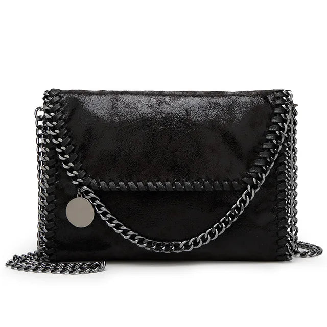 bags : Clutch Dames Bruin - Isabel Suède met Kettingdetail in Zwart van Pantino