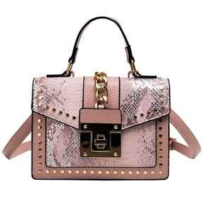 bags : Schoudertas Dames Wit - Imitatieslangenleer Studs Rock - Synthetisch Leer in Rosa van Pantino