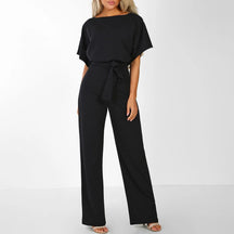dresses : Combinaison Femme Fluide Élégante Ceinturée Large Parfaite in Noir van Pantino