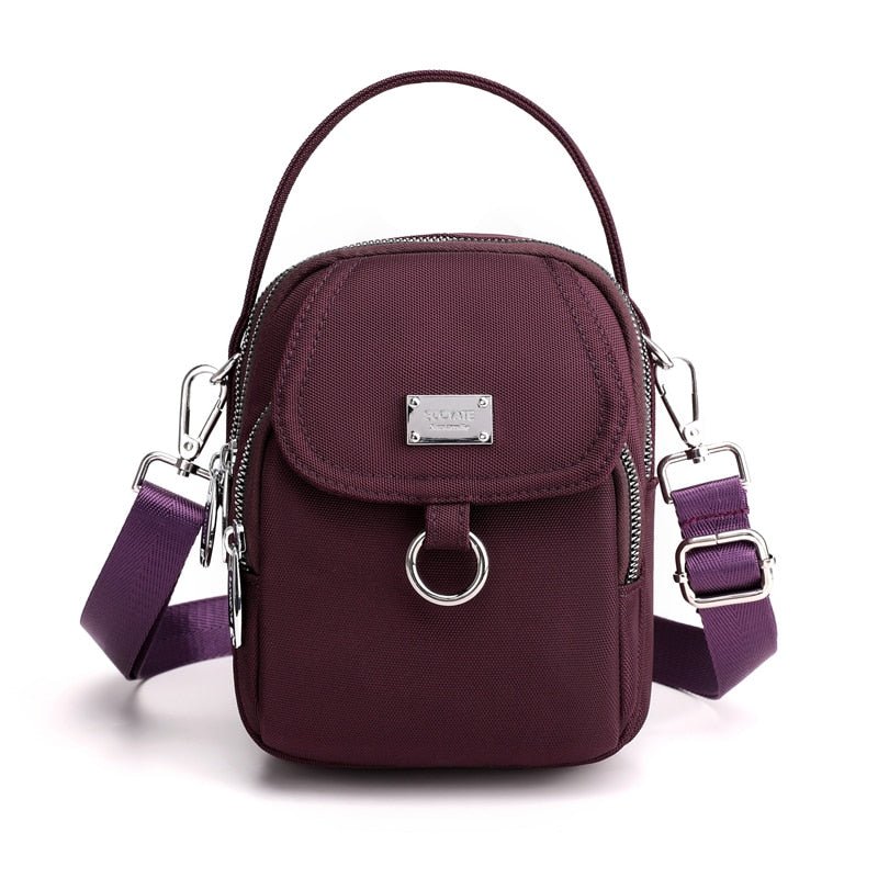 bags : Crossbody Tas Dames Zwart - Compact Dagelijks Gebruik - Kunstleer in Paars van Pantino