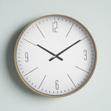 Simplicité dorée - Horloge dorée simple - Améliore votre intérieur avec un charme raffiné