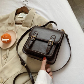 bags : Crossbody Tas Dames Zwart - Mini 5cm Sleutelhanger Formaat - Kunstleer in Koffie van Pantino