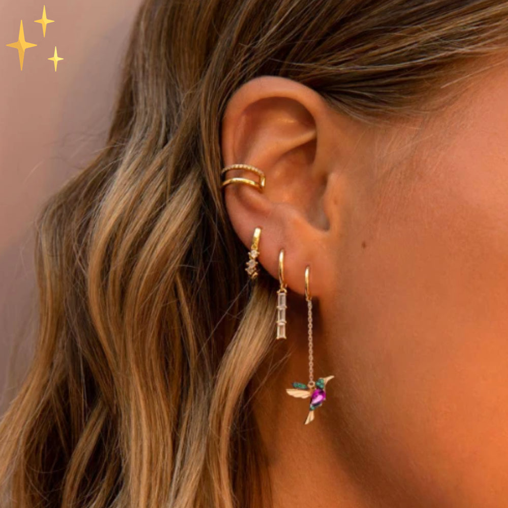 Earrings : Kolibrie Schitterende Gouden Oorhangers met Glinsterende Steentjes voor een Chique Uitstraling in van Pantino