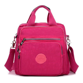 bags : Crossbody Tas Dames Zwart - 3-in-1 Waterdicht Multifunctioneel - Nylon in Fuchsia van Pantino