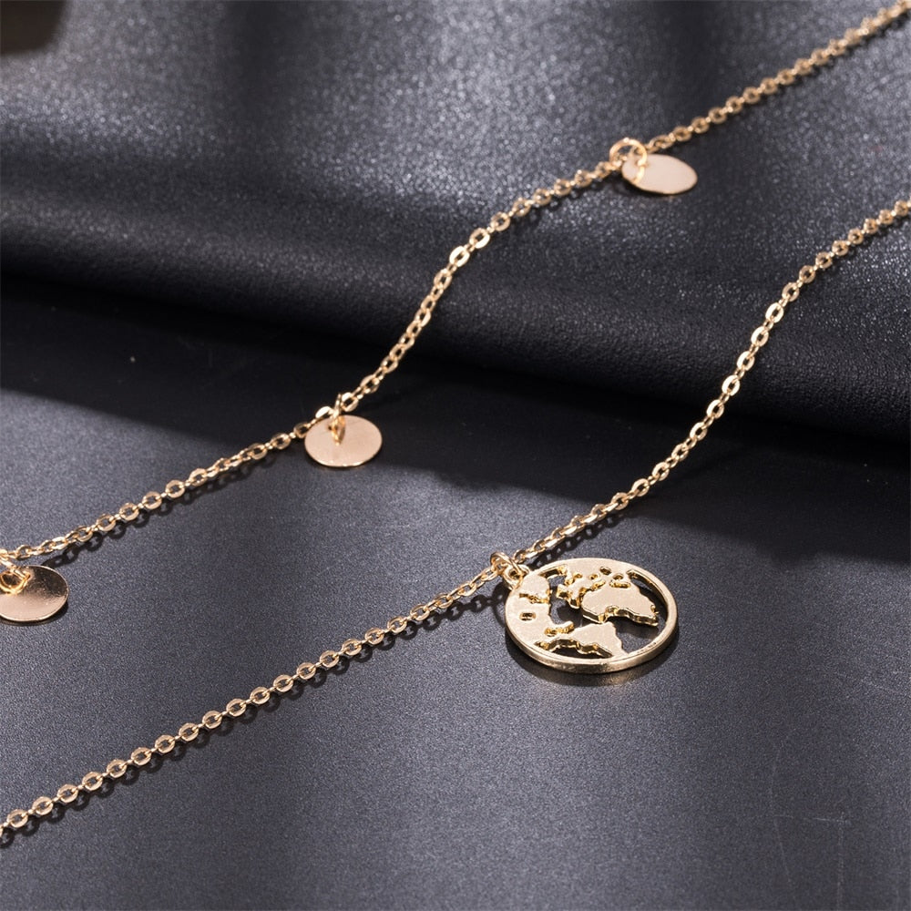 Necklace : Wereldbol Ketting Deluxe - Goudkleurig in van Pantino