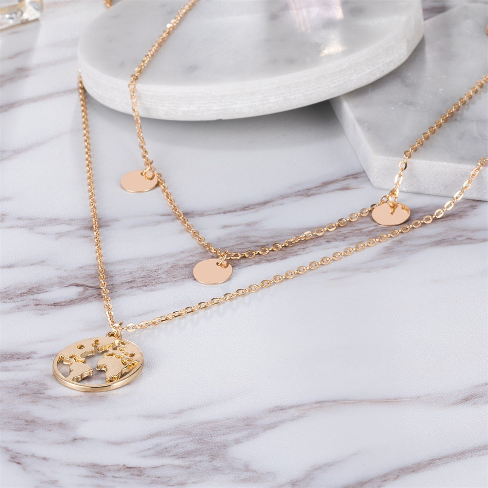 Necklace : Wereldbol Ketting Deluxe - Goudkleurig in van Pantino
