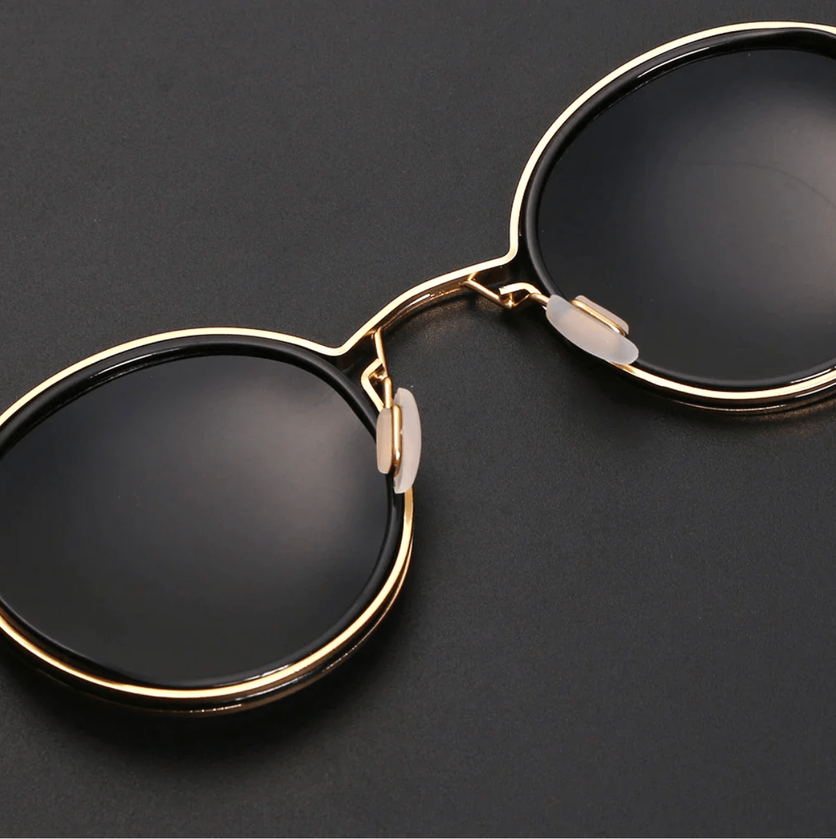 Sunglasses : Dames Zonnebril Goudkleurig Metaal UV4400 - Trendy Design in van Pantino